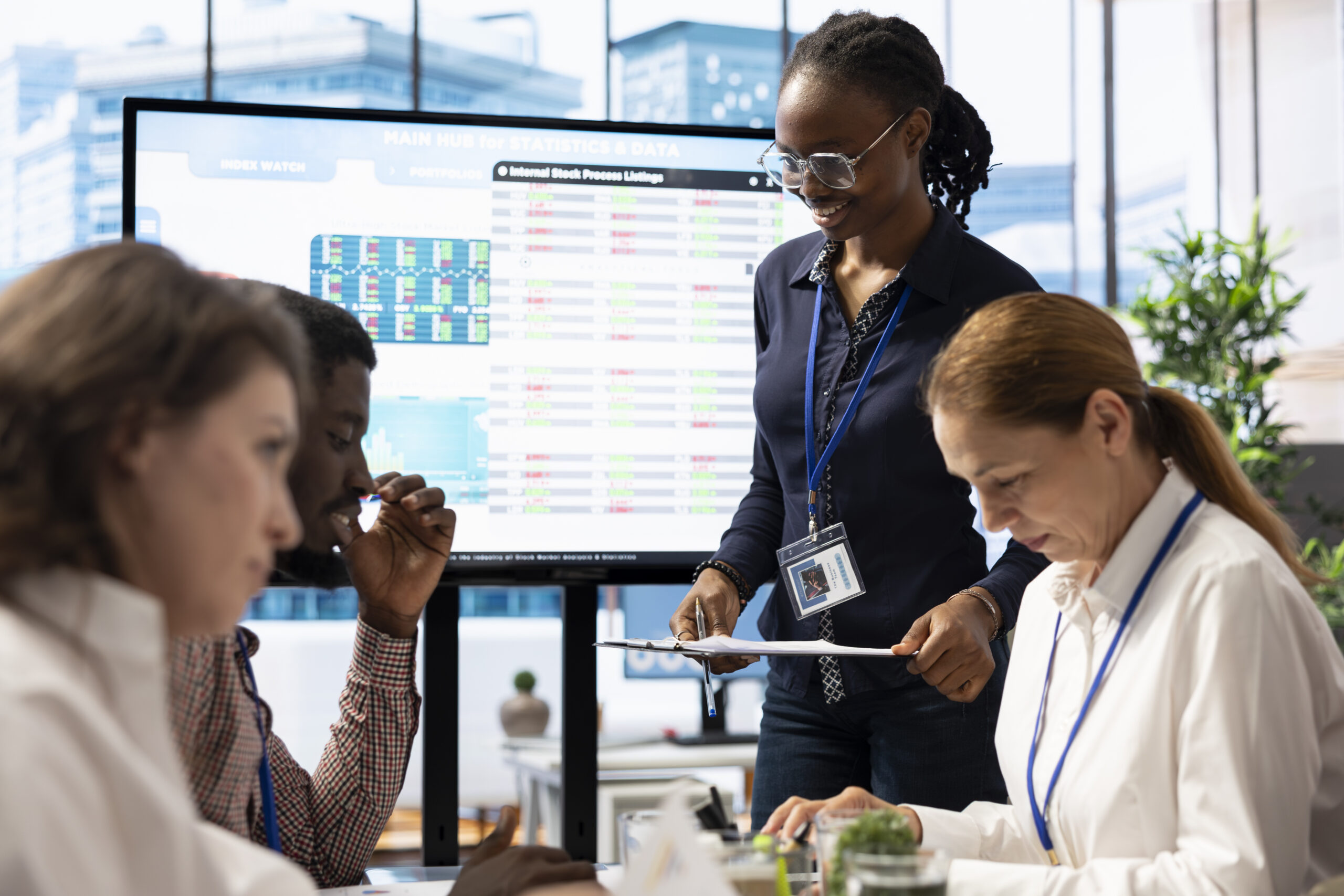 Business analyst creating an interactive board presentation with project updates